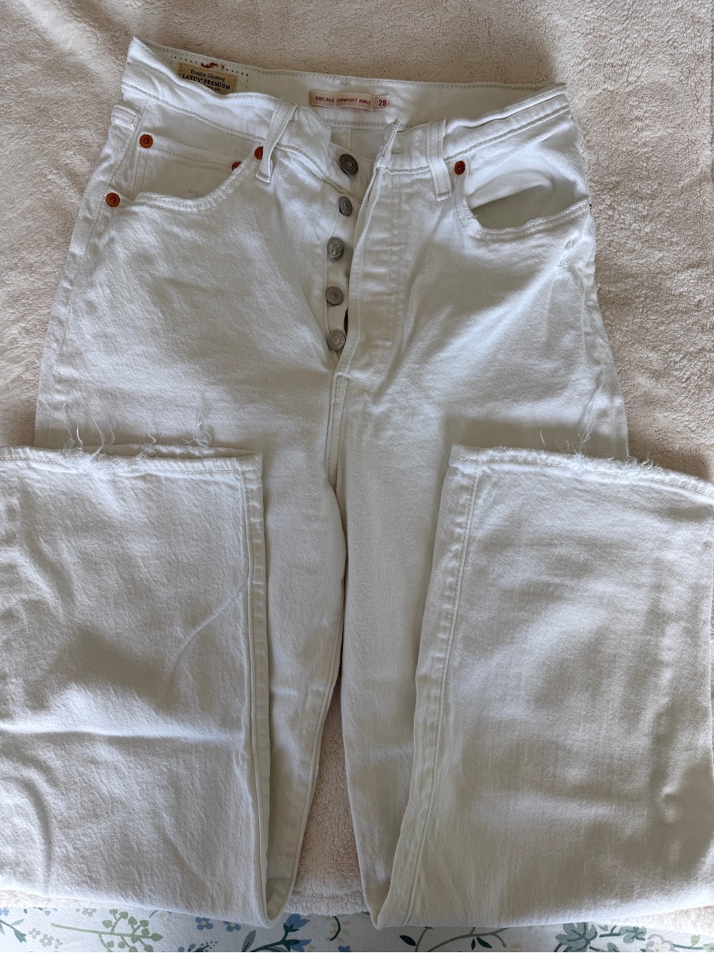 Levi's High-Rise White Button-Fly Jeans with Raw Hem